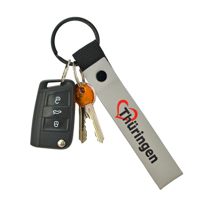 Schlüsselanhänger grau